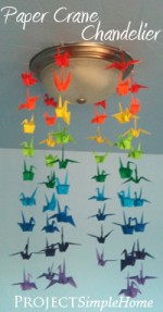 A rainbow paper crane light shade